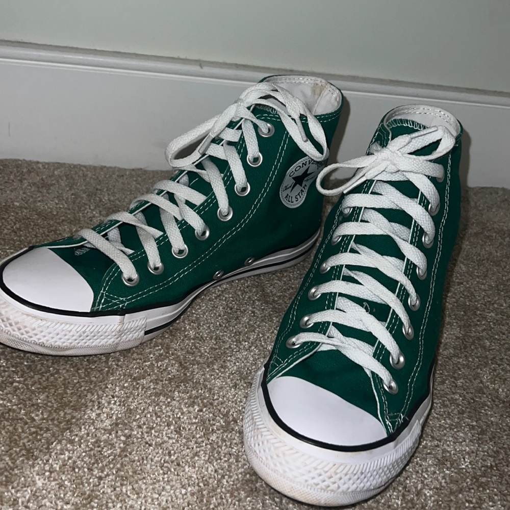 green converse.